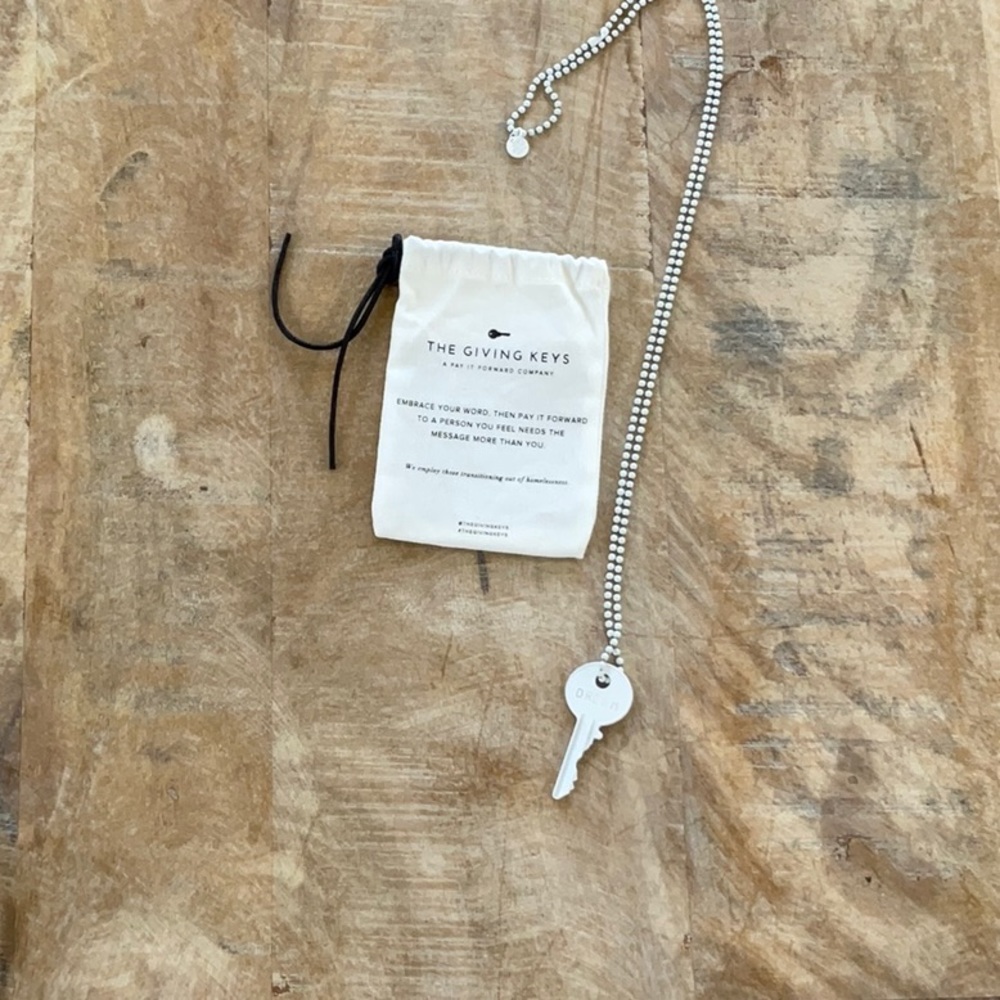 The Giving Keys white dream key and chain with bag. New.